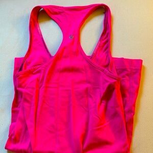 Hot pink lululemon razor back workout top